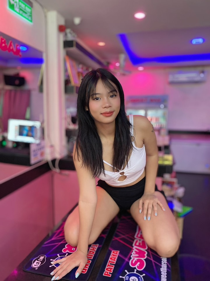 Thai Girl On A Bar Table