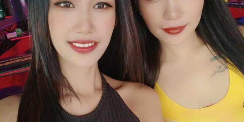 Two Thai Bar Girls Taking A Selfie