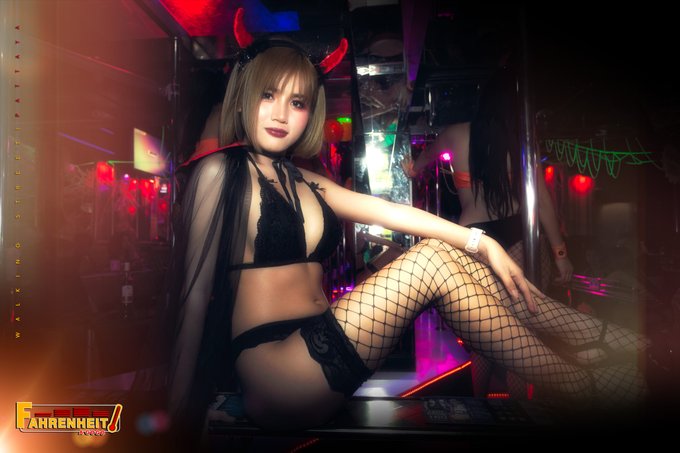 teen bargirl dressed in devil outfit