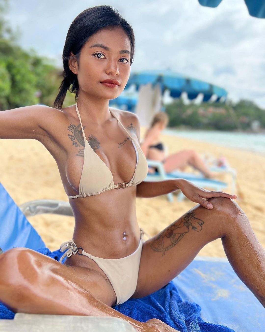 Oiled Thai Girl At The Beach