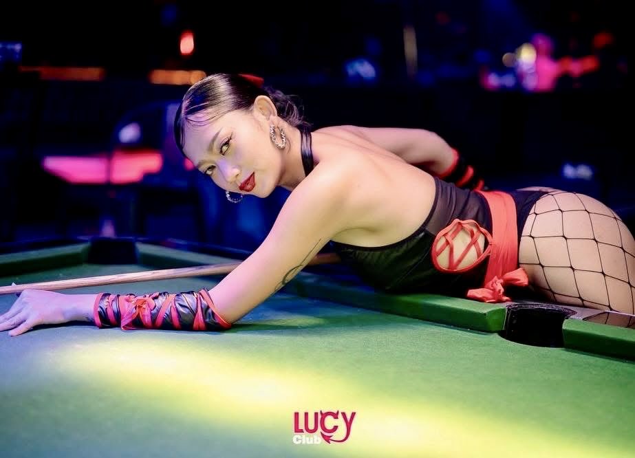 Thai girl playing pool
