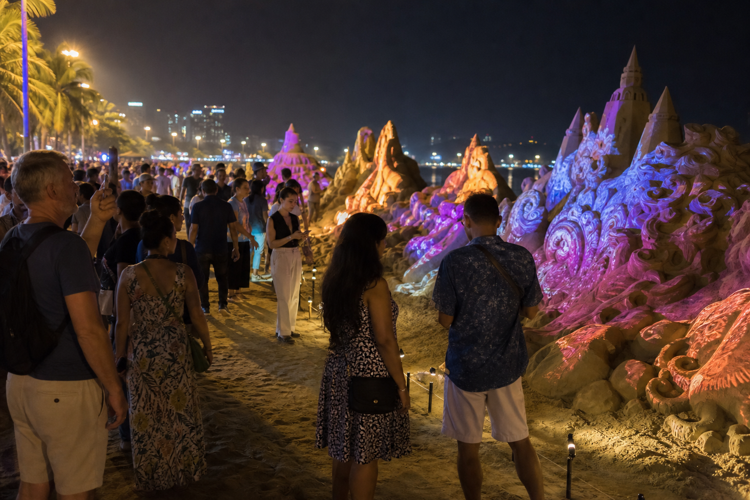 Nighttime Sand Artwork Draws Visitors to Beach Road