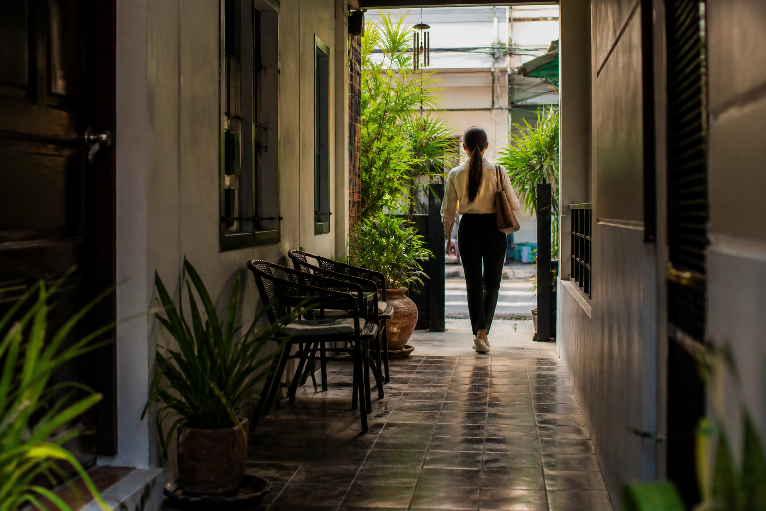 The Woman Leaves for Work and Promises to Return